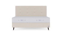 Boxspringbett Prestige von Bruno – in Glory Soft Beige, Opus-Kopfteil, Füße aus Espresso-Buche